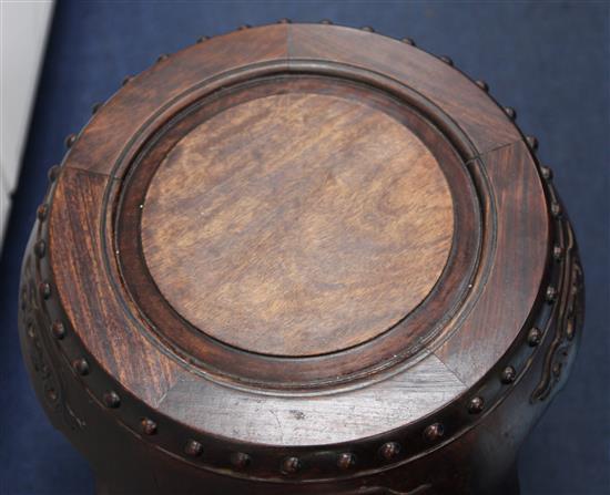 A pair of Chinese hongmu barrel shaped stools, late 19th / early 20th century, H.46cm Diameter 43cm
